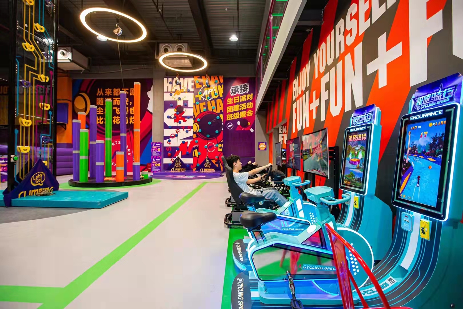 Trampoline park with climbing wall and Arc game 
