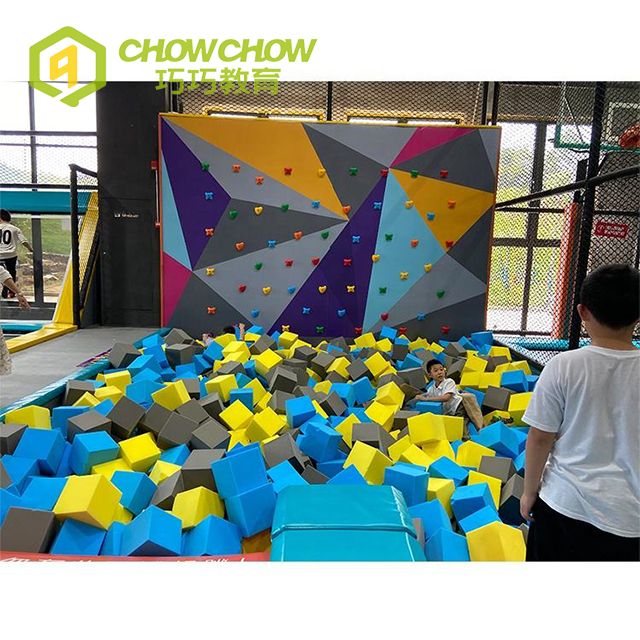 Qiaoqiao Indoor Trampoline Park Equipment Customized Climbing Wall with Big Slide