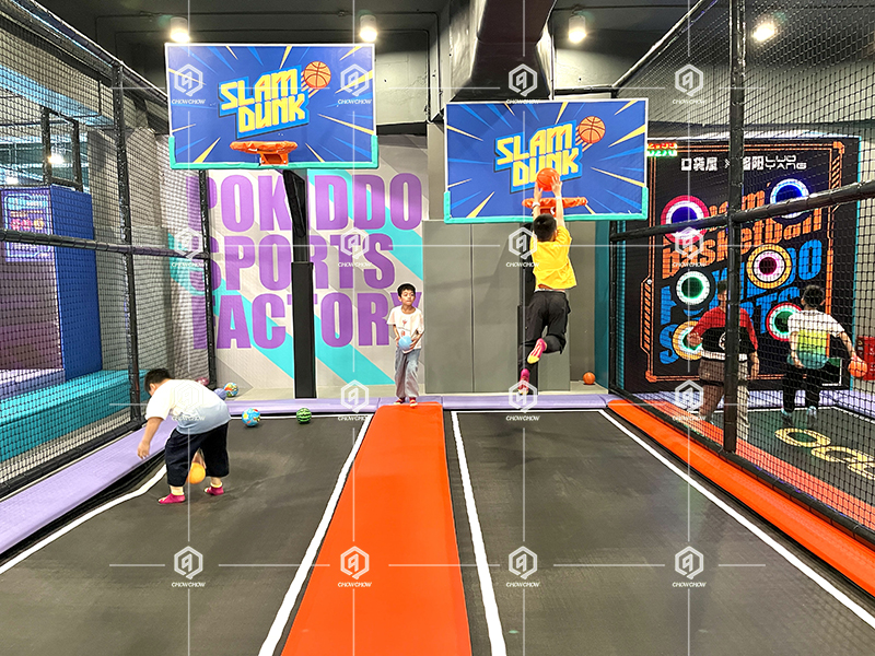 trampoline park with basketball court